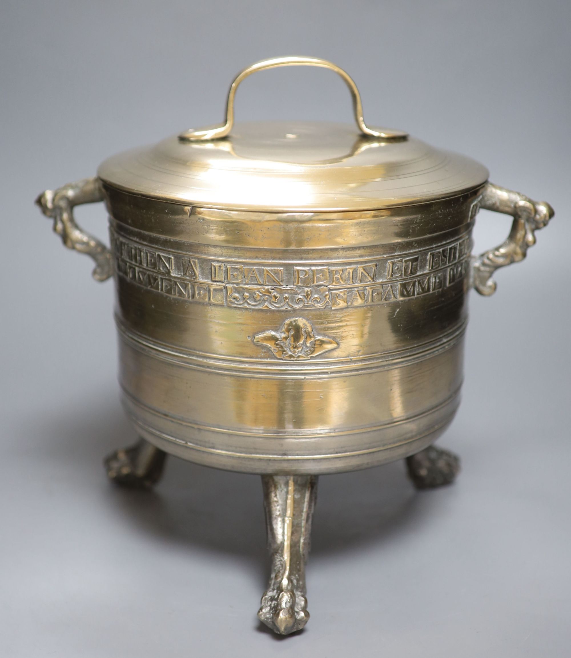 An early 18th century French bronze bowl, dated 1715, with cover, height 29cm